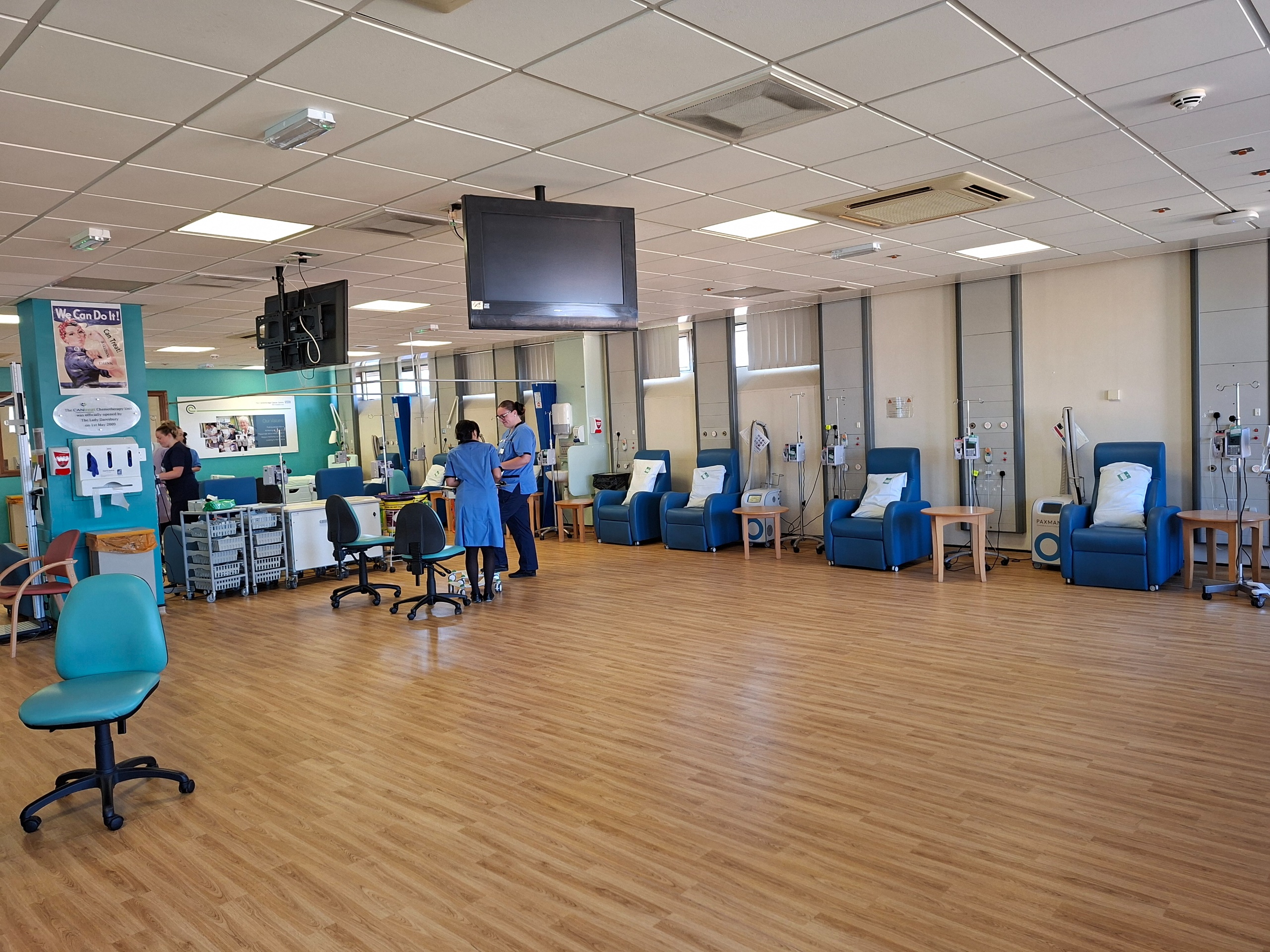 Dated looking hospital unit with treatment chairs