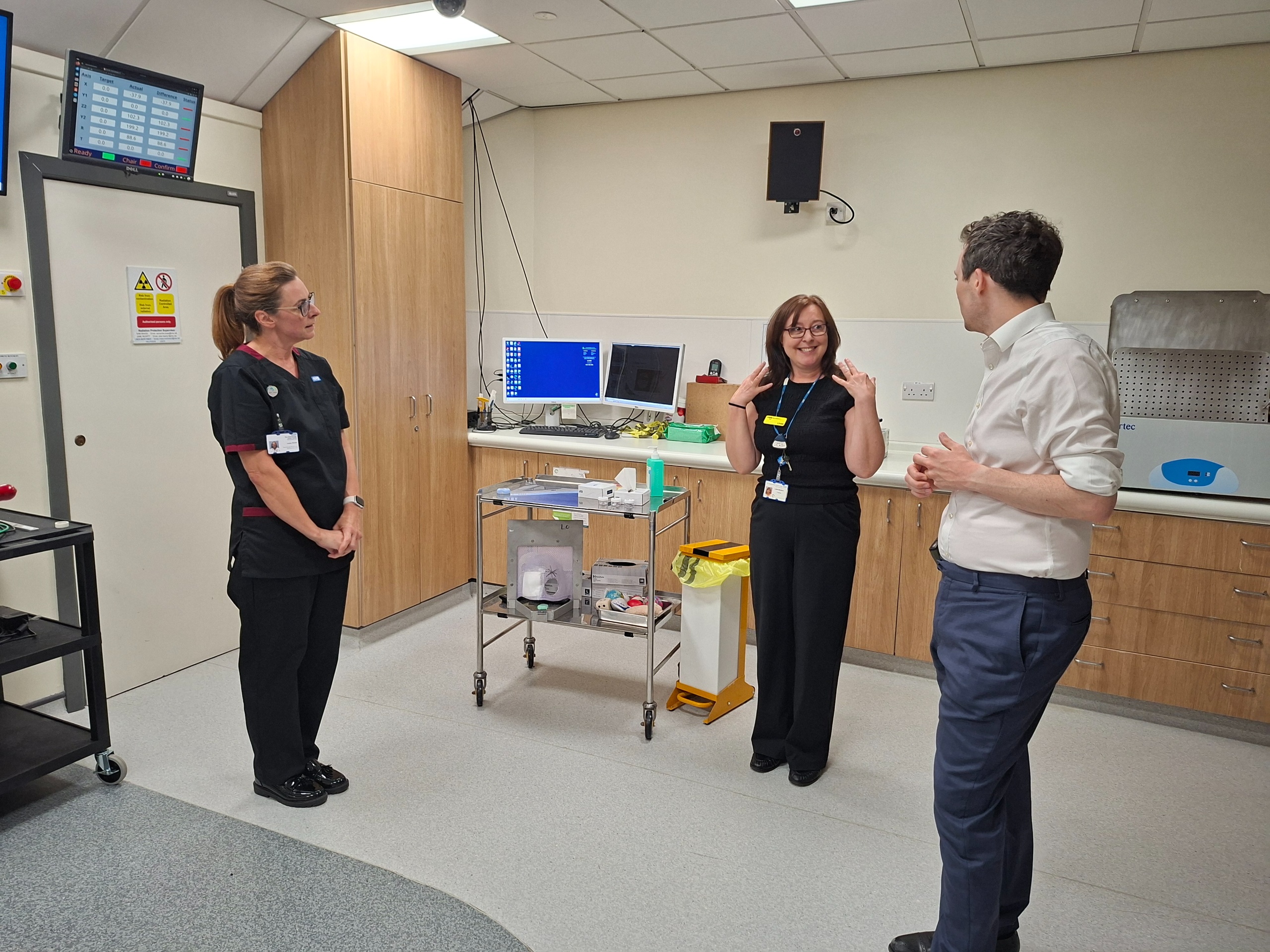 People in a clinical treatment room